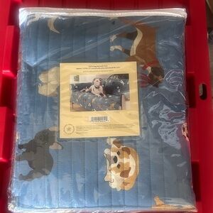 New in package. Plow & Hearth. Blue Dog Print Sofa Cover 112w an 71 long w/arms
